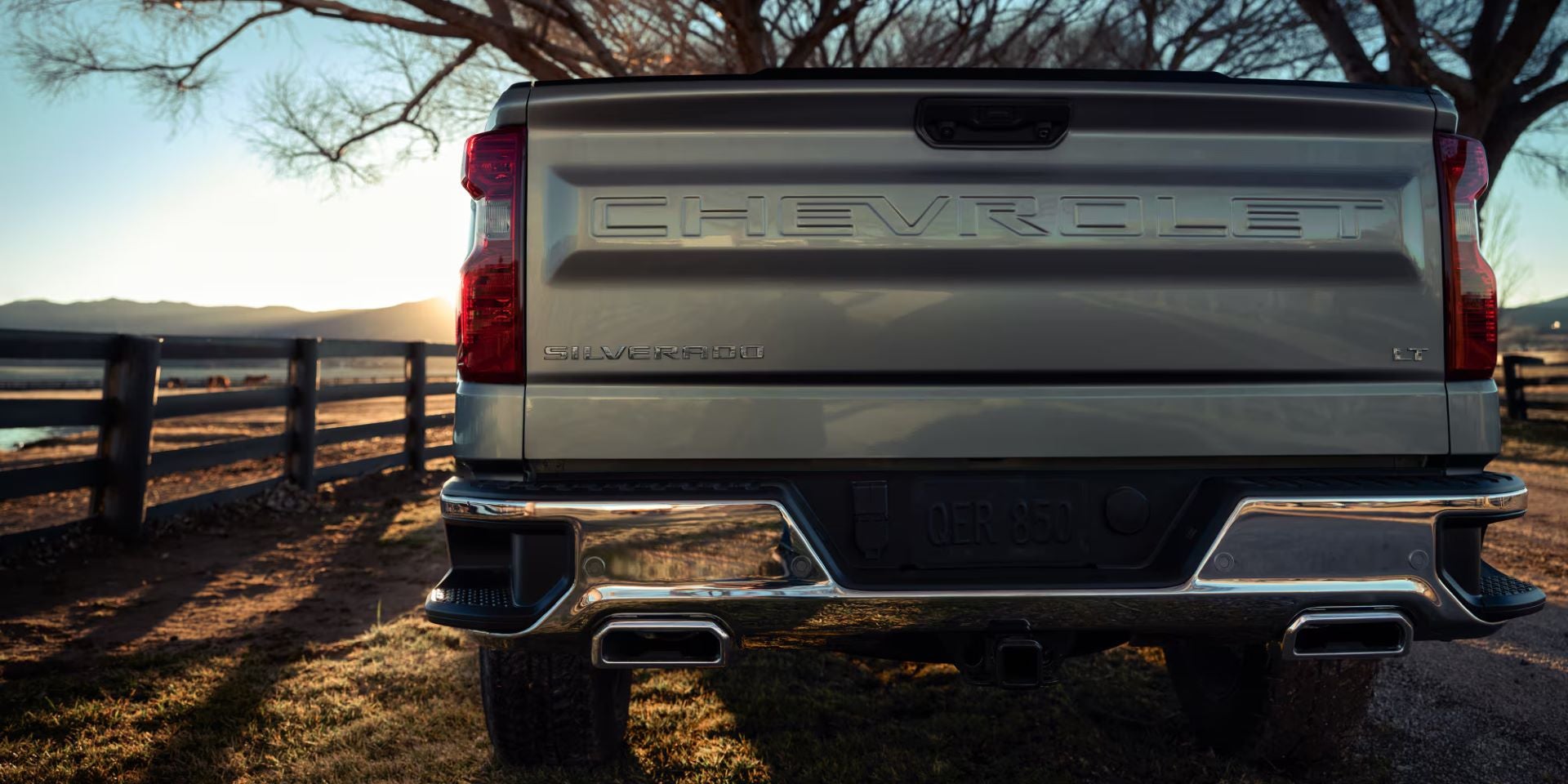 A Chevrolet logo on Silverado bed door rear view