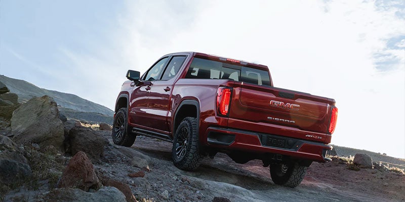 Off roading Red truck rear view